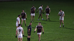 <p>FINDING THEIR FEET: Kildare and Galway players after the game. Picture: ©INPHO/Bryan Keane</p>