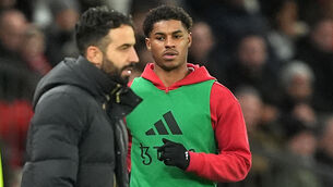 <p>Manchester United's Marcus Rashford warms up on the sidelines during a Premier League match against Newcastle. Picture: Martin Rickett/PA Wire.</p>