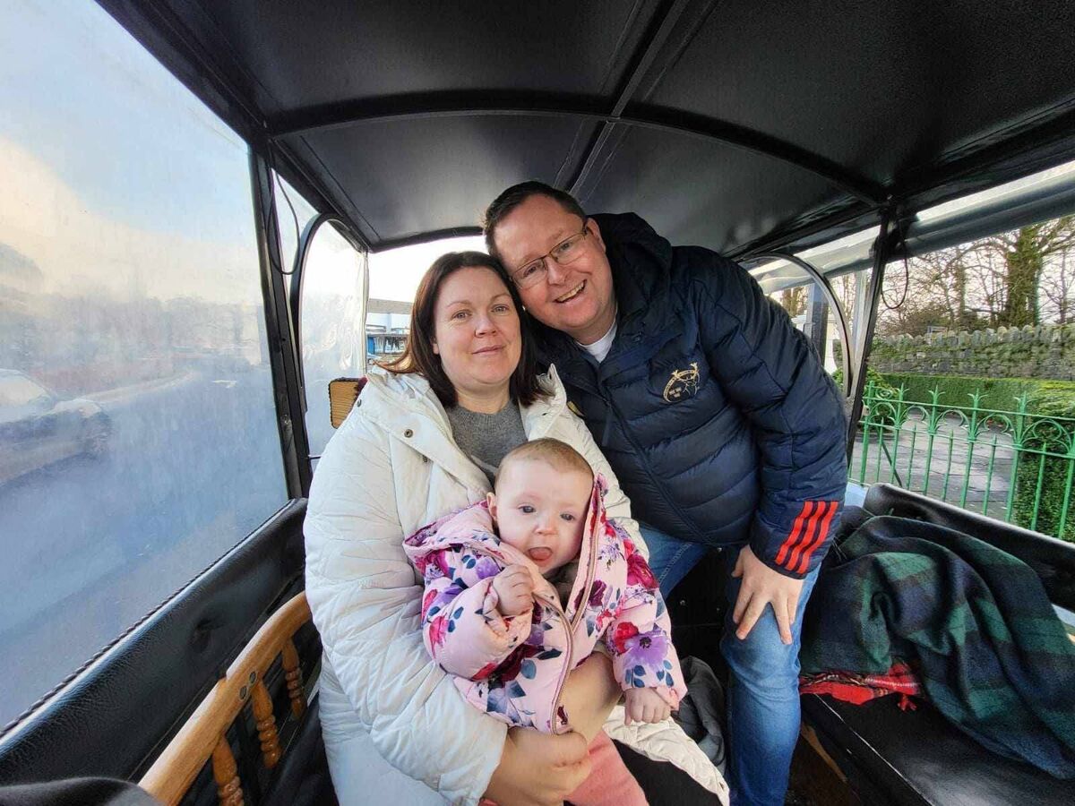 Donna O'Loughlin, Athea and her husband Joe pictured with Baby Precious. 