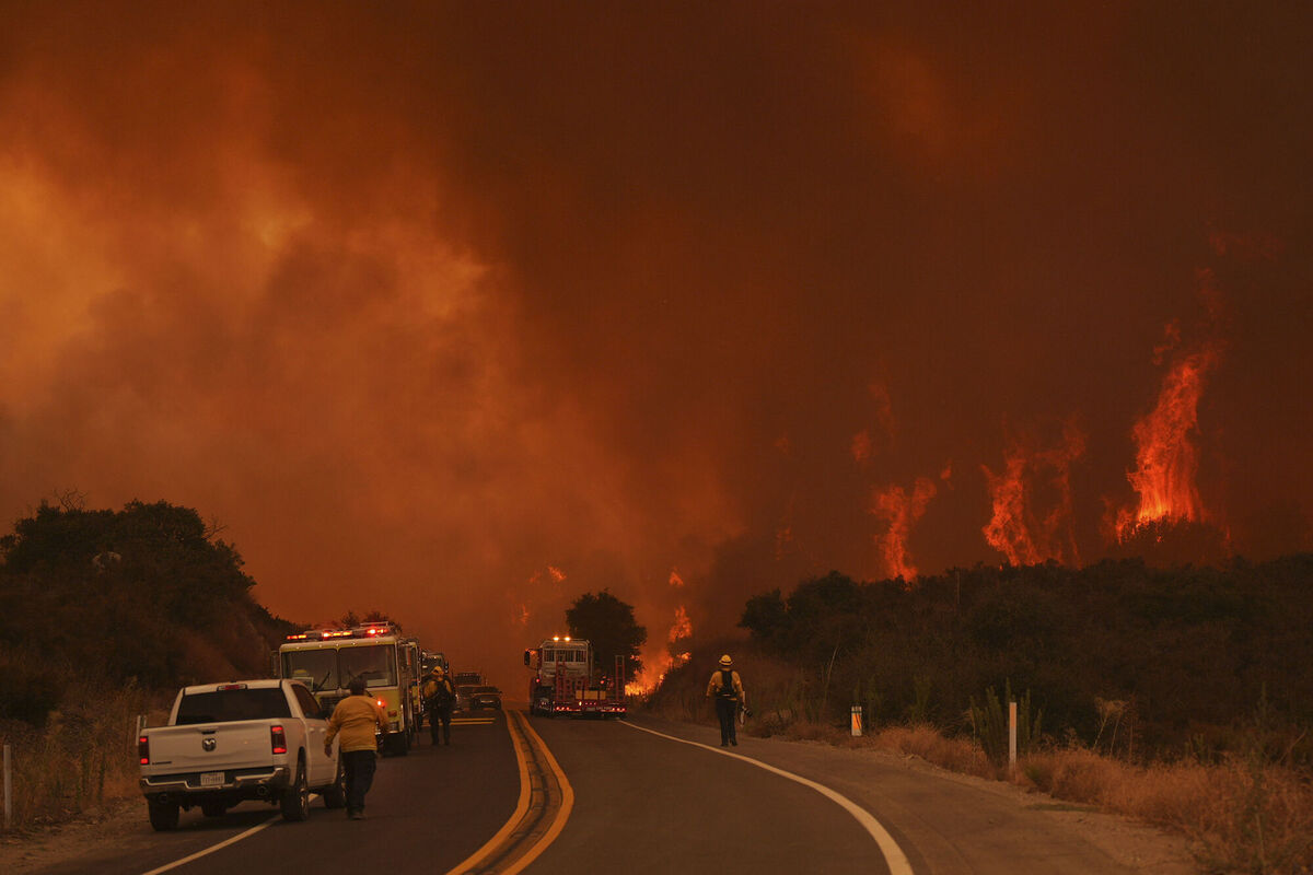 A wildfire in El Cariso, California, in September. Photo: AP/Eric Thayer A wildfire in El Cariso, California, in September. Photo: AP/Eric Thayer