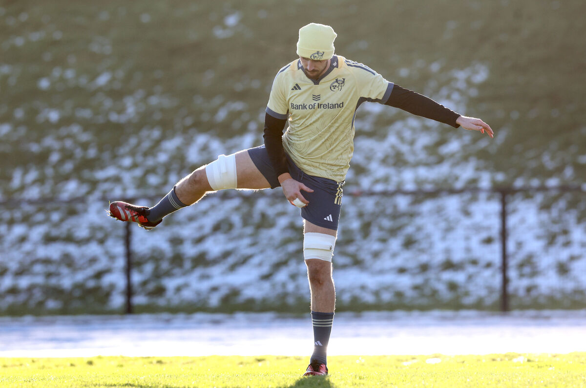 Munster's Tom Ahern warems up during Munster training. Picture: James Crombie/Inpho
