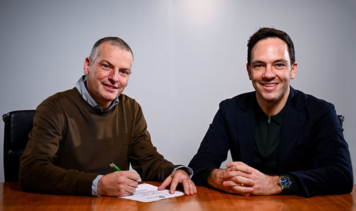13 December 2024; Republic of Ireland U21 manager Jim Crawford, left, with FAI chief football officer Marc Canham, as he signs a contract renewal, at FAI Headquarters in Abbotstown, Dublin. Picture: Seb Daly/Sportsfile