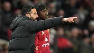 <p>THAT'S THE WAY: Manchester United manager Ruben Amorim gives instructions to Manchester United's Kobbie Mainoo during the Premier League match at Old Trafford, Manchester. Pic: Martin Rickett/PA Wire.</p>
