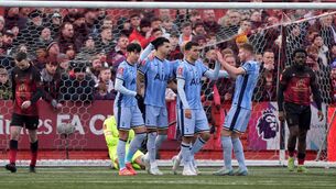 <p>EVENTUALLY: Dejan Kulusevski and Brennan Johnson scored in extra-time for Tottenham at Tamworth (Joe Giddens/PA)</p>