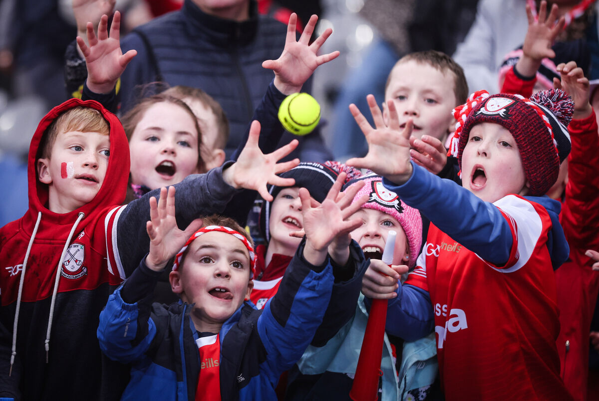 Watergrasshill fans attempt to catch a match sliotar. Pic: ©INPHO/Tom Maher Watergrasshill fans attempt to catch a match sliotar. Pic: ©INPHO/Tom Maher
