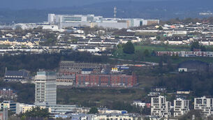 <p>Apple’s campus atop Hollyhill overlooking the west side of Cork City. Landmarks in the foreground include Cork County Hall and the Crow’s Nest student accommodation. 	<span class="contextmenu emphasis CaptionCredit">Picture: Larry Cummins</span>
            </p>