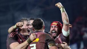 <p>Munster’s John Hodnett scores a try and celebrates with Gavin Coombes and Tom Farrell. Picture: ©INPHO/Billy Stickland</p>