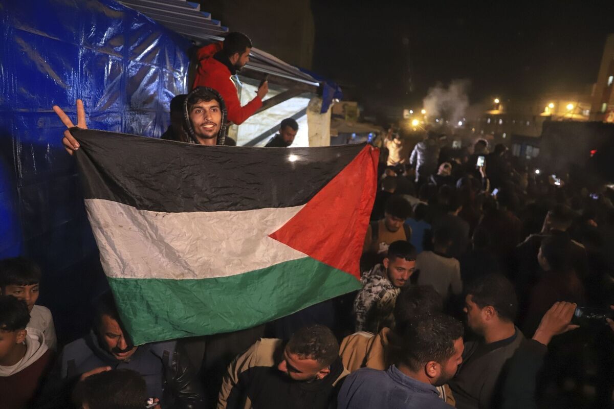 While people celebrated the pact in Gaza and Israel, Israel's military escalated attacks after the announcement, the civil emergency service and residents said. While people celebrated the pact in Gaza and Israel, Israel's military escalated attacks after the announcement, the civil emergency service and residents said.