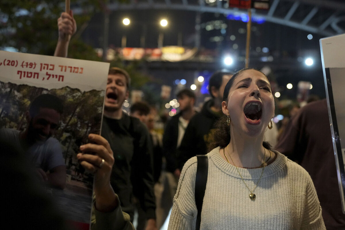 Relatives and friends of people killed and abducted by Hamas and taken into Gaza, react to the ceasefire announcement as they take part in a demonstration in Tel Aviv, Israel on Wednesday Picture: AP Photo/Ohad Zwigenberg