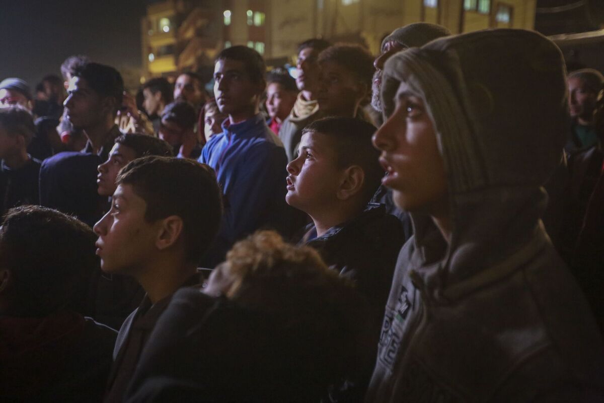 Palestinians watch TV as they await the imminent announcement of a ceasefire deal between Hamas and Israel in Khan Younis, central Gaza Strip, Wednesday, Jan. 15, 2025.Picture: AP Photo/Jehad Alshrafi