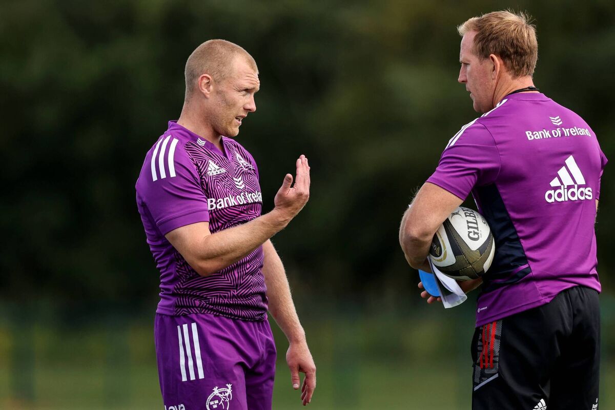Keith Earls with attack coach Mike Prendergast during a 2022 Munster training session. Picture: ©INPHO/Ben Brady