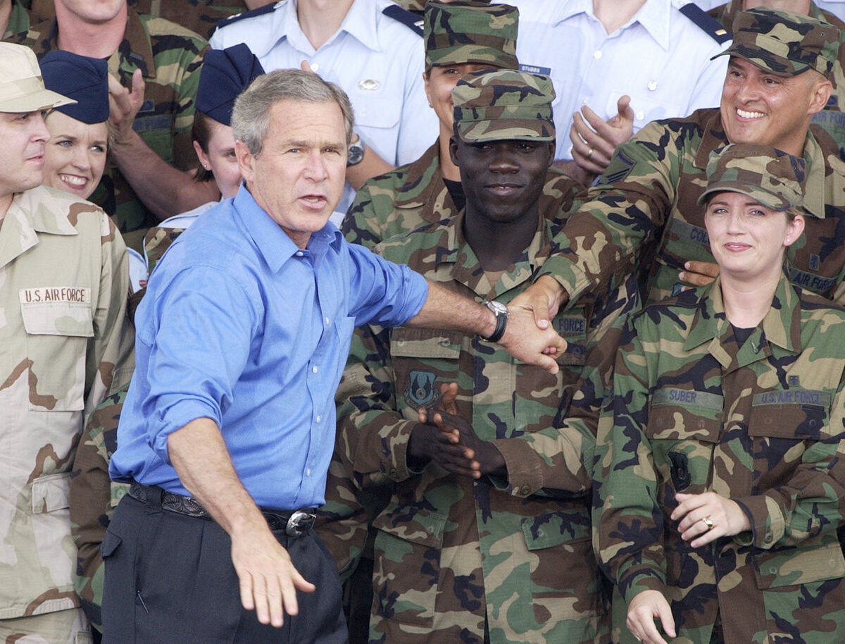 Then US president George W 'Dubya' Bush at a US air force base in 2003.  Bush and his cabinet launched the so-called war on terror which claimed millions of lives. Picture: Al Behrman/AP