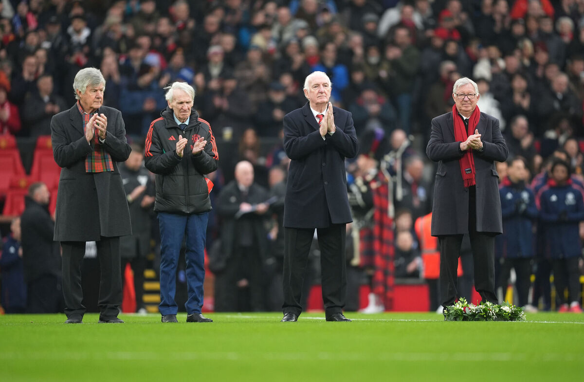 Alex Ferguson (right) observes a tribute to the late Denis Law ahead of the Premier League match at Old Trafford, Manchester. Picture: Martin Rickett/PA Wire.