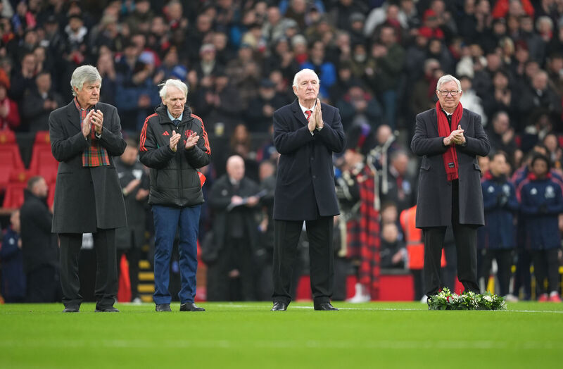 Alex Ferguson (right) observes a tribute to the late Denis Law ahead of the Premier League match at Old Trafford, Manchester. Picture: Martin Rickett/PA Wire. Alex Ferguson (right) observes a tribute to the late Denis Law ahead of the Premier League match at Old Trafford, Manchester. Picture: Martin Rickett/PA Wire.