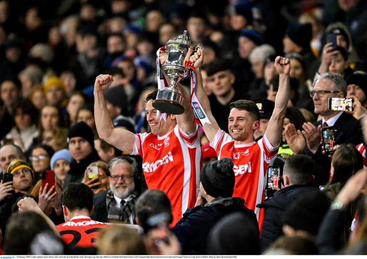 Cuala captains James Power, left, and Luke Keating lift the Andy Merrigan cup after the AIB GAA Football All-Ireland Senior Club Championship final match between Cuala and Errigal Ciarán at Croke Park in Dublin. Photo by Daire Brennan/Sportsfile