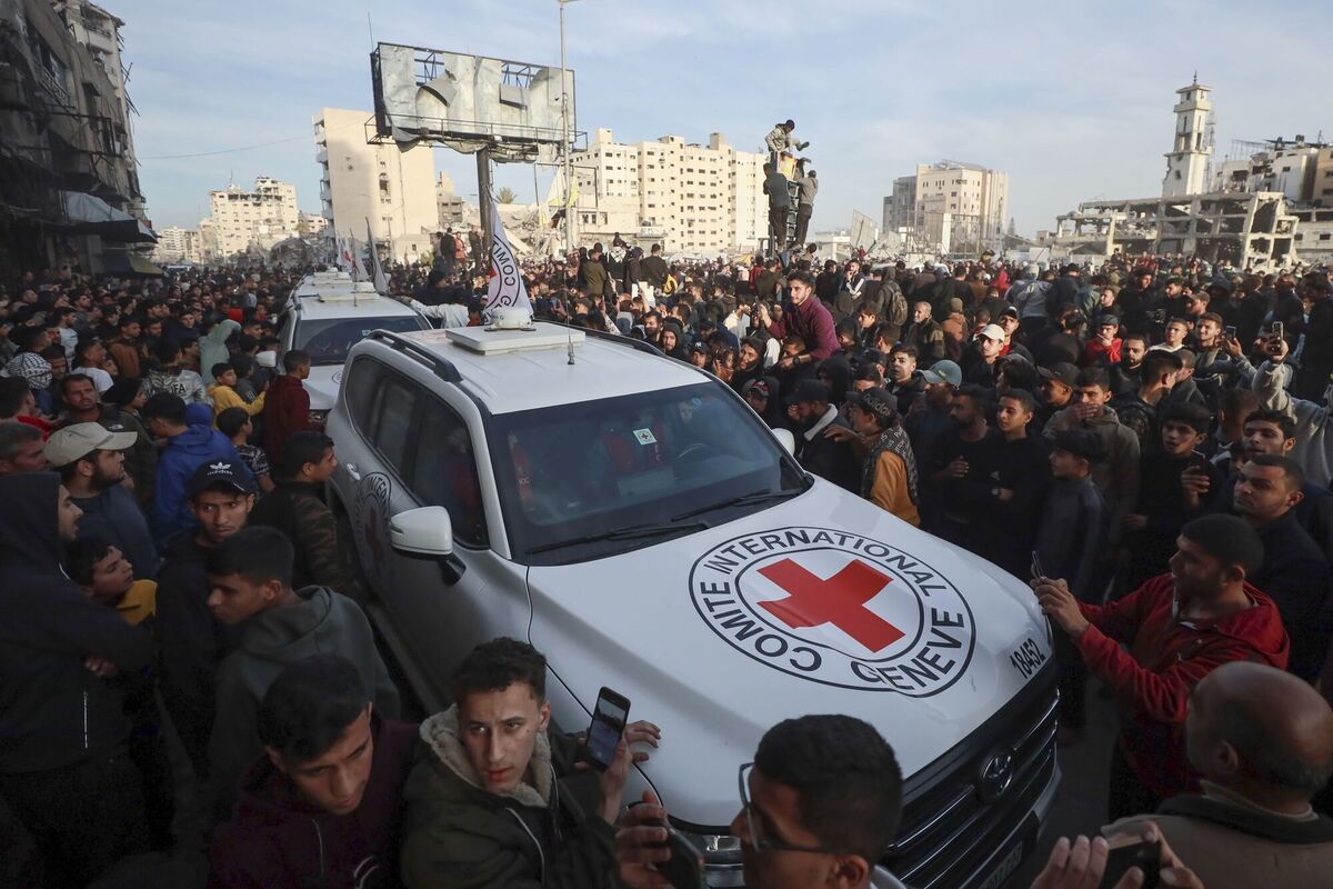 A Red Cross convoy arrives to collect Israeli hostages released after a ceasefire agreement between Israel and Hamas took effect. Picture: AP Photo/Abed Hajjar A Red Cross convoy arrives to collect Israeli hostages released after a ceasefire agreement between Israel and Hamas took effect. Picture: AP Photo/Abed Hajjar