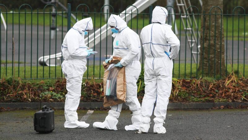 Gardaí carry out a forensic search of the grounds of Ballywaltrim Community Centre carpark. Picture: Padraig O'Reilly