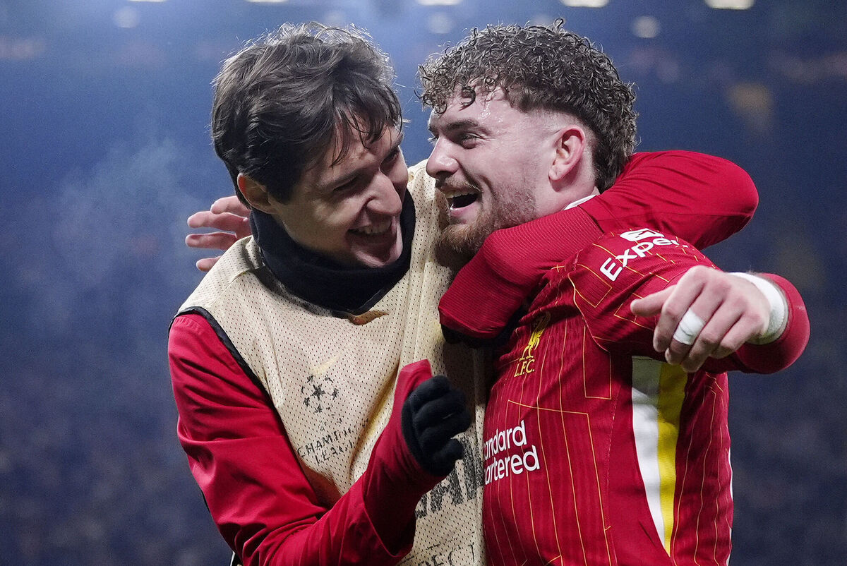 Liverpool's Harvey Elliott (right) celebrates the deflected winner with Federico Chiesa