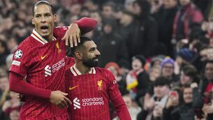 <p>Virgil van Dijk, left, celebrates with Mohamed Salah (Jon Super/AP)</p>