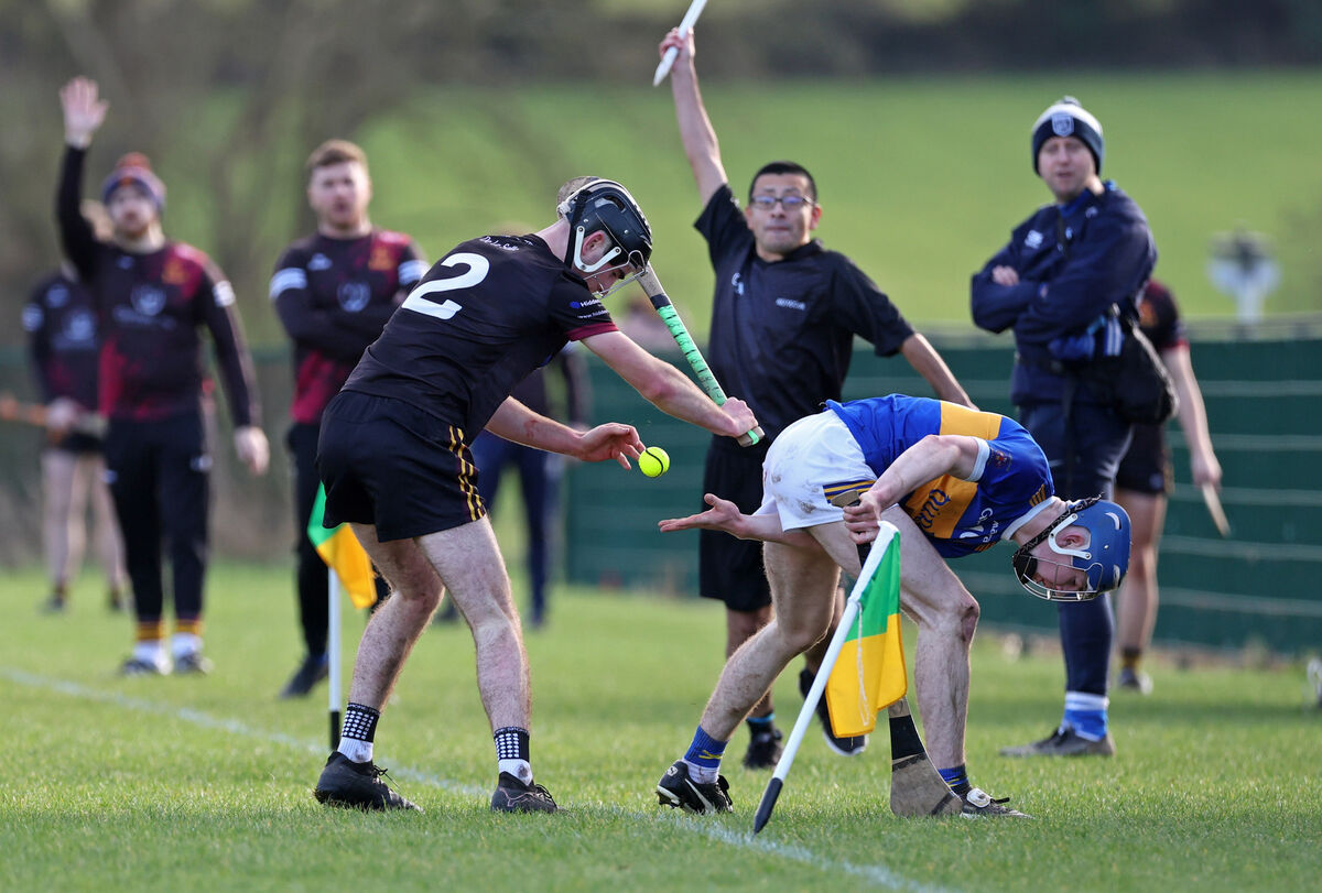  Philip Power, De La Salle College, battles near the sideline with James Butler, Thurles CBS.P icture: Jim Coughlan.