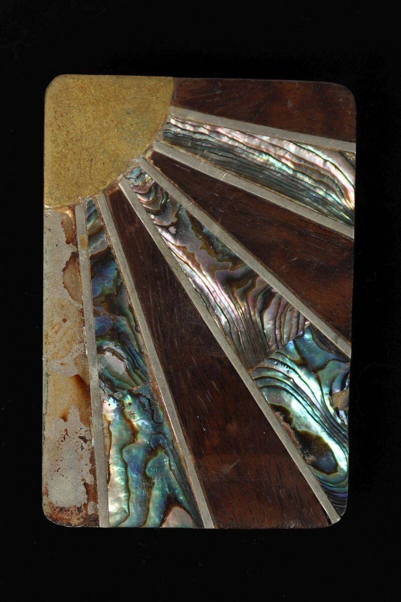 A pair of art deco silver and mother-of-pearl belt buckles at Sheppard's.