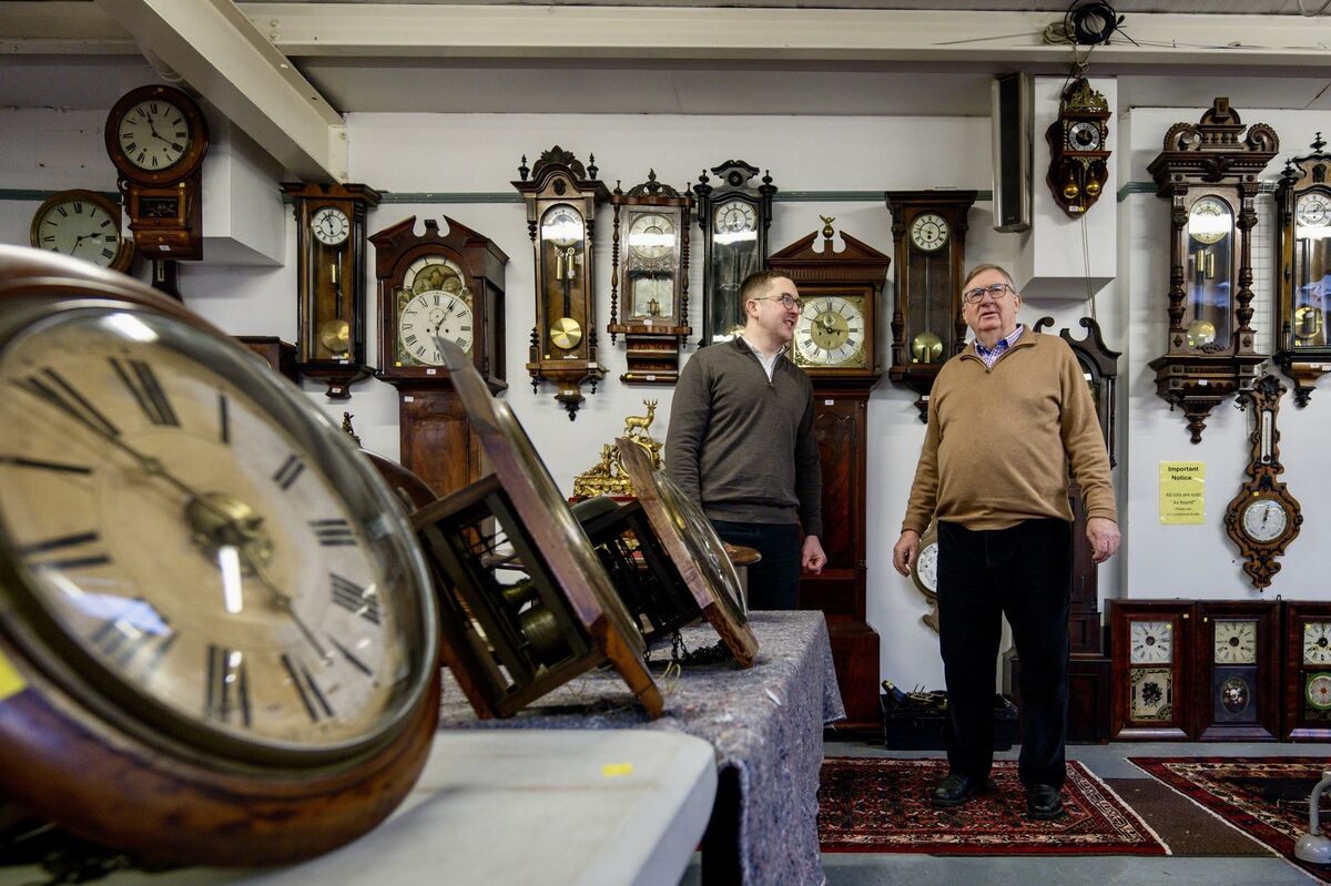 Thomas and Rody Keighery beside an original William Maddock, one of over 70 grandfather clocks included in the auction. Thomas and Rody Keighery beside an original William Maddock, one of over 70 grandfather clocks included in the auction.