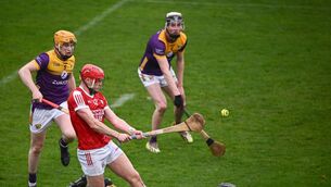 <p>Wexford players Simon Donohoe, left, Eoin Ryan and Conor Foley look on as Alan Connolly of Cork scores his side's second goal during a 2024 Allianz Hurling League game. Photo by Ray McManus/Sportsfile</p>
