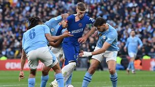 <p>Chelsea's Cole Palmer vies with Manchester City's Nathan Ake, Rodri and Ruben Dias during the FA Cup semi-final last season (Photo by GLYN KIRK/AFP via Getty Images)</p>