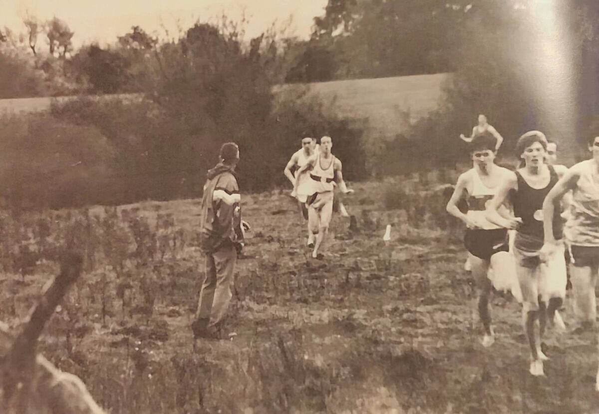 OUTSTANDING IN HIS FIELD: Coaching at a cross-country event. OUTSTANDING IN HIS FIELD: Coaching at a cross-country event.