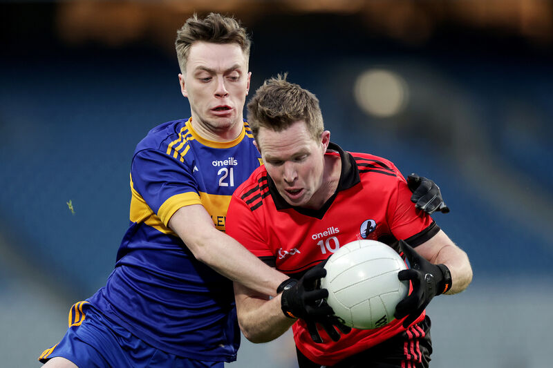 Naomh Padraig's Padraig O Loideain and Andrew McCarron of Carraroe