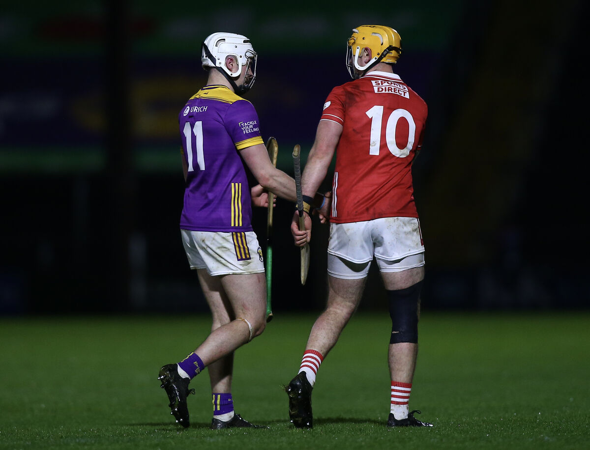 Wexford’s Rory O’Connor and Cork’s Declan Dalton shake hands after being sent off. Pic: ©INPHO/Ken Sutton