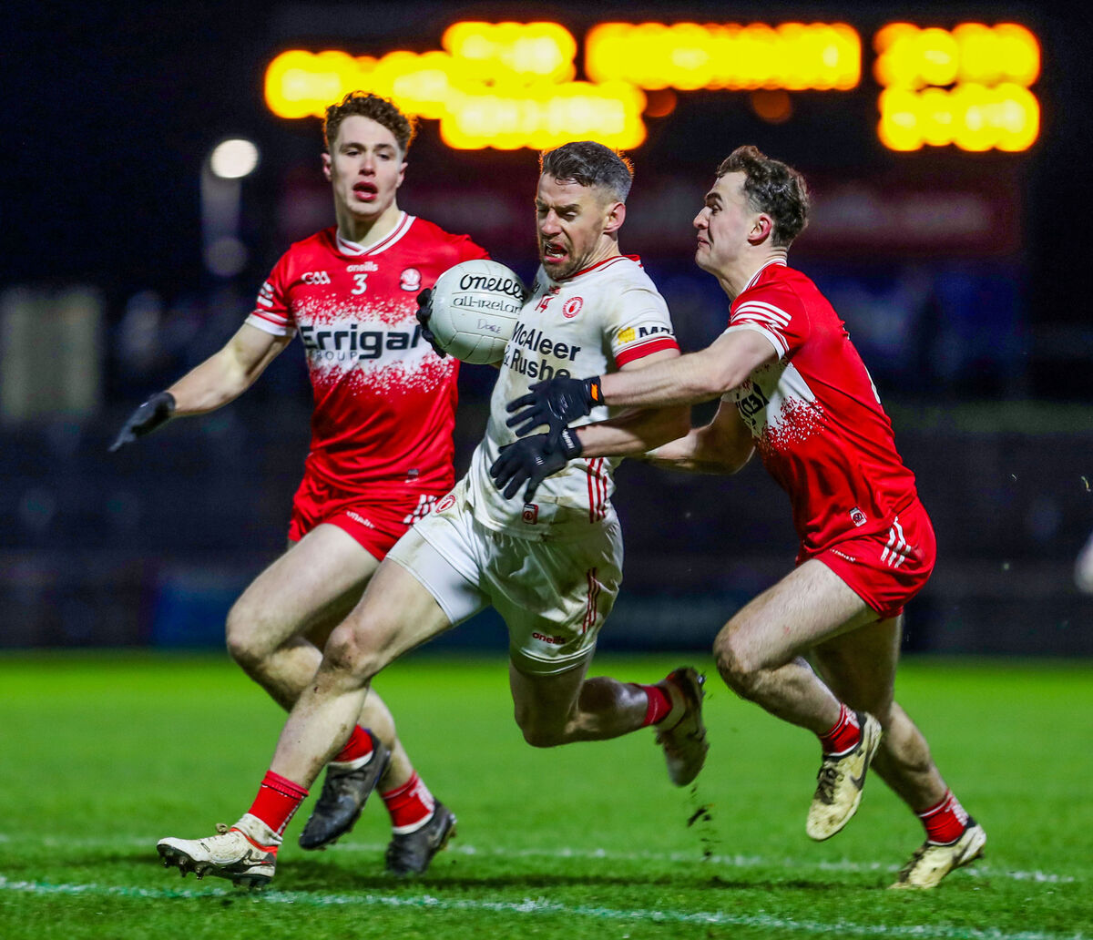 Tyrone's Mattie Donnelly with Derry's Eoin McEvoy and Diarmuid Baker. Pic ©INPHO/Lorcan Doherty
