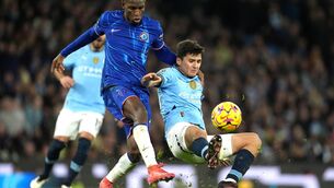 <p>TOUGH DEBUT: Manchester City's Abduqodir Khusanov (right) and Chelsea's Nicolas Jackson battle for the ball. Pic: Martin Rickett/PA Wire.</p>
