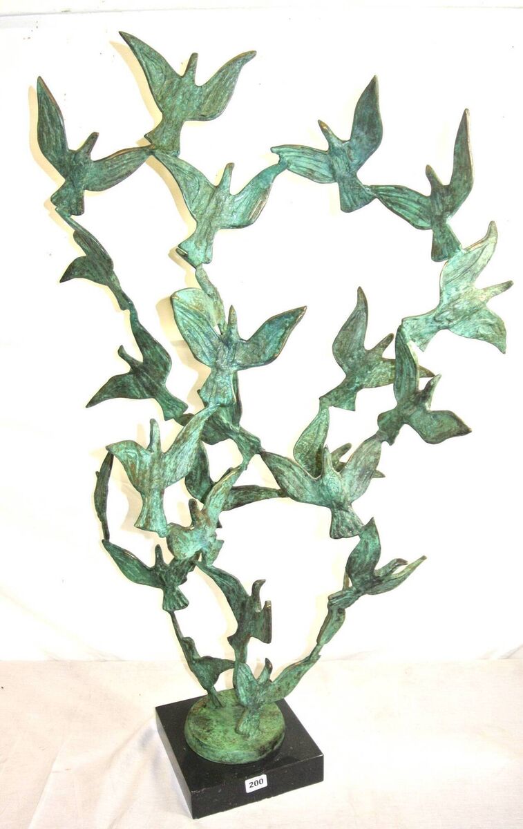 The sculpture 'Birds in Flight' by John Behan. 