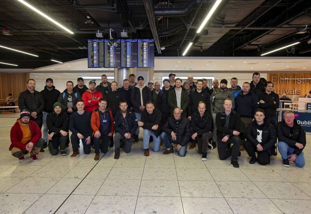 Crews arriving in Ireland to help ESB Networks  restore power in the areas worst hit by Storm Éowyn include this team of 36 from Finland who arrived at Dublin Airport today, Tuesday. Picture: Chris Bellew/Fennells 