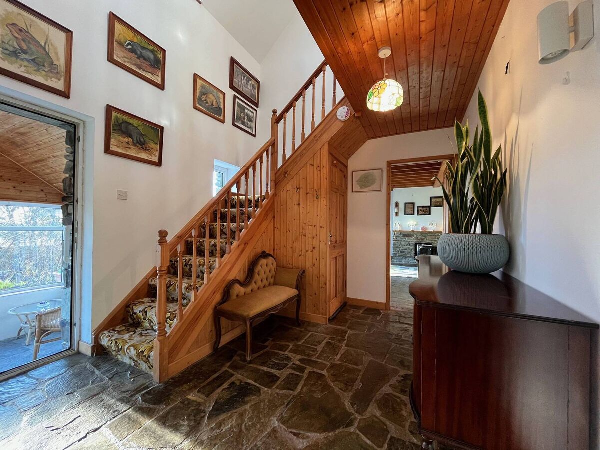 Wind in the Willows characters framed on the stair wall