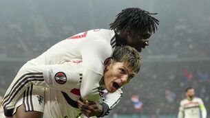 <p>Kobbie Mainoo celebrates with Alejandro Garnacho after scoring United's second</p>