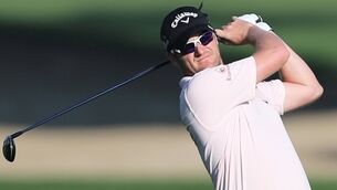McIlroy leads the way in Dubai