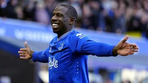 <p>Abdoulaye Doucoure celebrates scoring the opening goal (Peter Byrne/PA)</p>