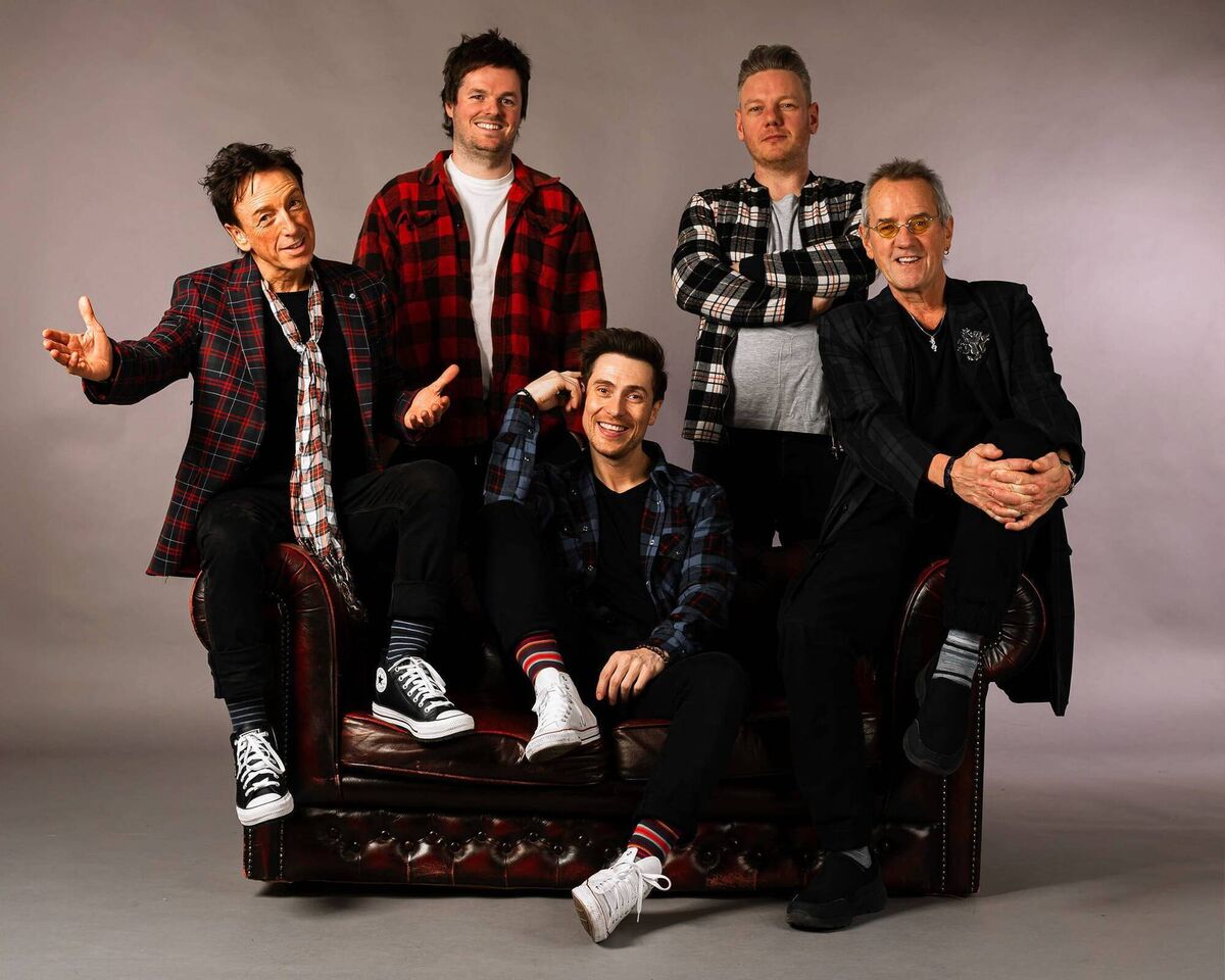 Woody (on right) with the other members of the Bay City Rollers. 