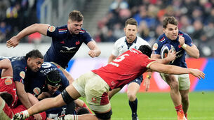 <p>France's Antoine Dupont (right) is tackled by Wales' Dafydd Jenkins. Pic: Adam Davy/PA Wire.</p>