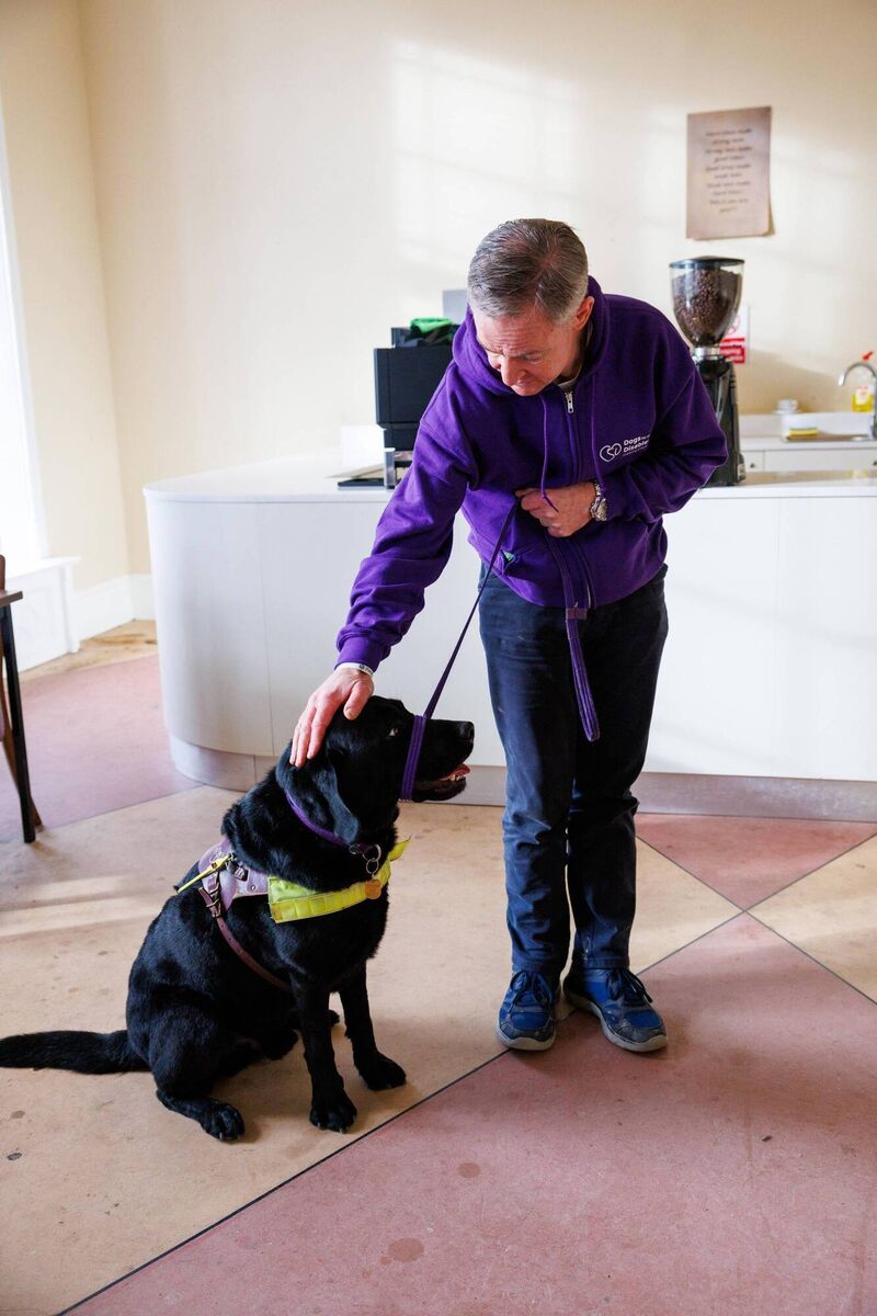 Duncan Hughes (Service User) with Leon. 'Leon anchors me, so I am able to walk again,' says Duncan. Picture: Jeff Harvey