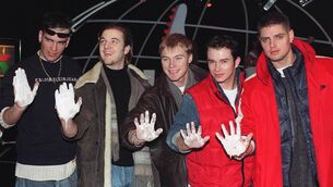 <p>Boyzone at a PR event getting their hands moulded back in their heyday. </p>