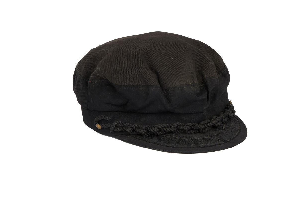 Leonard Cohen's "magic writing" black Greek fisherman's hat at Julien's.
