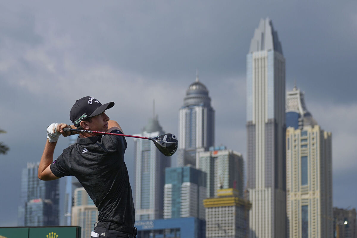 Tom Mckibbin of Northern Ireland hits off the first tee during the final round of the Dubai Desert Classic golf tournament, in Dubai, United Arab Emirates, Sunday, Jan. 19, 2025. (AP Photo/Altaf Qadri) Tom Mckibbin of Northern Ireland hits off the first tee during the final round of the Dubai Desert Classic golf tournament, in Dubai, United Arab Emirates, Sunday, Jan. 19, 2025. (AP Photo/Altaf Qadri)