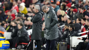 <p>Tottenham boss Ange Postecoglou on the touchline at Anfield (Nick Potts/PA)</p>