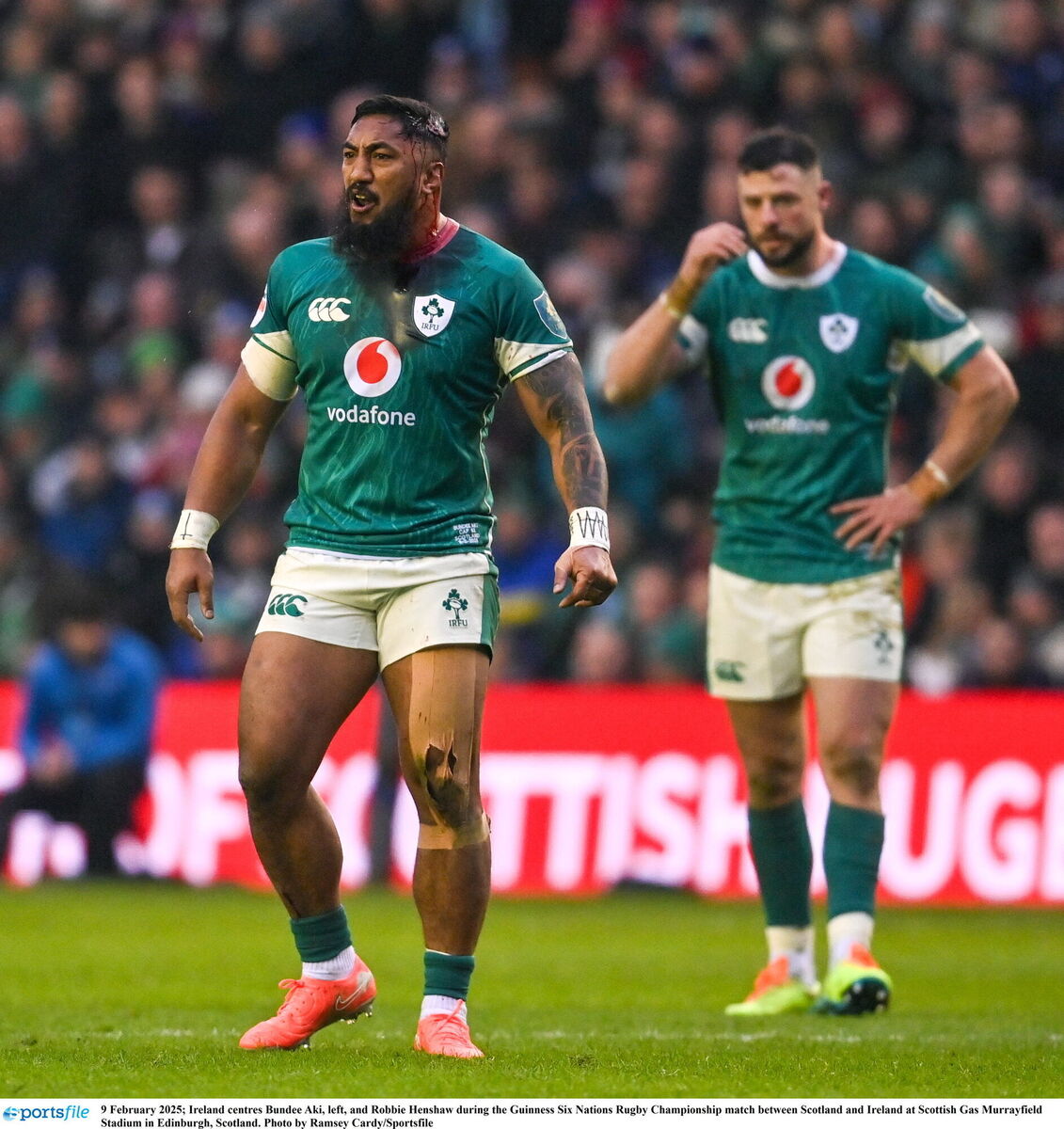 BLOODIED: Ireland centres Bundee Aki, left, and Robbie Henshaw. Pic: Ramsey Cardy/Sportsfile