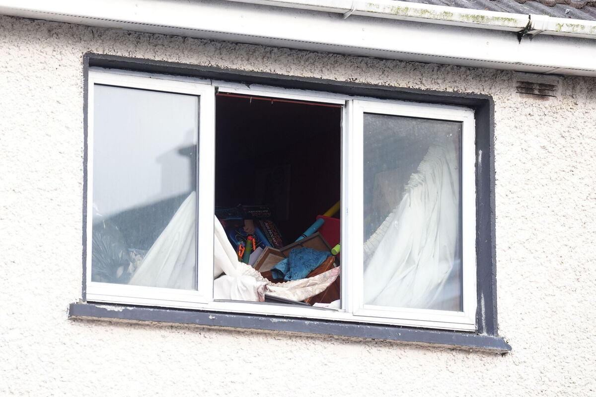 An open upstairs window at the house in Navan, Co Meath where Elizabeth Clarke was living in 2013 which is now being searched by gardaí. Picture: Brian Lawless/PA An open upstairs window at the house in Navan, Co Meath where Elizabeth Clarke was living in 2013 which is now being searched by gardaí. Picture: Brian Lawless/PA