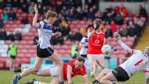 <p>CHAMPIONS: St. Patrick's Odhran Doherty denied by Abbey's Aidan Quinn, Eoghan O'Neill and Lewis McCaughan. Pic: ©INPHO/Lorcan Doherty</p>