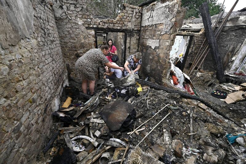 People searching the ruins of a house after a Russian Shahed drone fell onto a residential area in Zaporizhzhia, Ukraine, last August 27. Picture: Ukrinform/NurPhoto/Getty